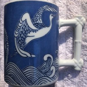 Blue and white cup coffee cup with bird on it